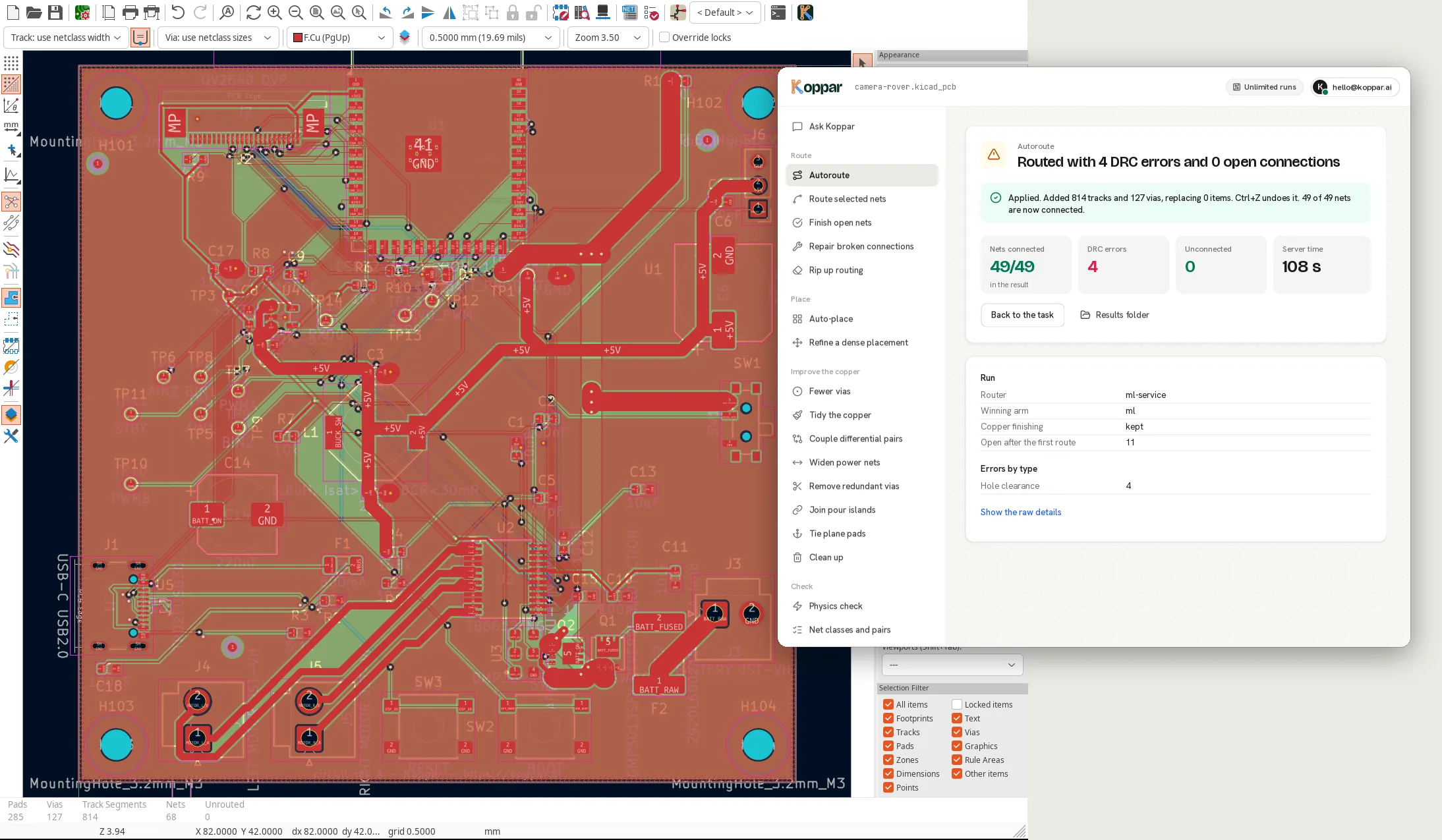 KiCad's PCB editor with a four-layer camera rover board routed by Koppar, and the Koppar window showing the result: all 49 nets connected, applied to the board.